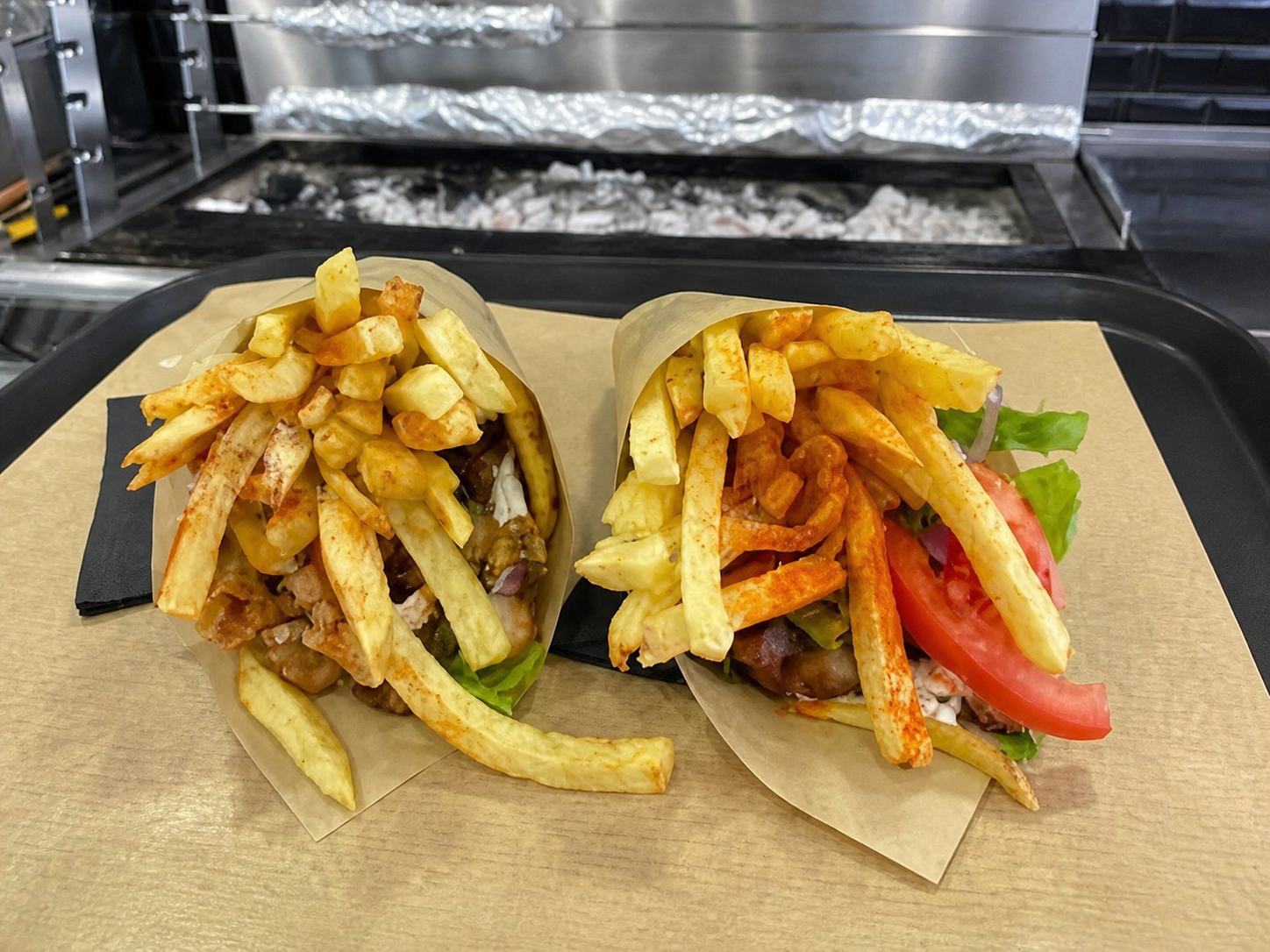 Two gyros with fries, enhanced from a supplied photograph